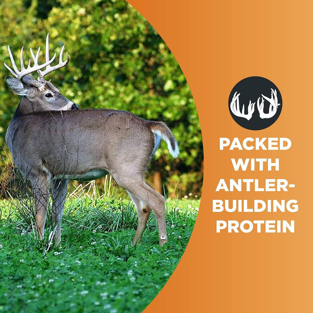 Deer standing in grass with orange product badge for antler-building protein