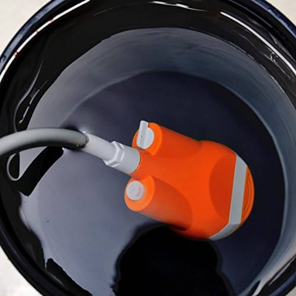 Portable shower water outlet with orange pump and gray hose