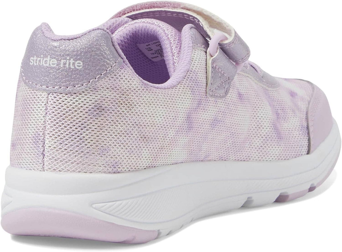 Light lavender light-up sneaker side view with padded collar and glowing lace area