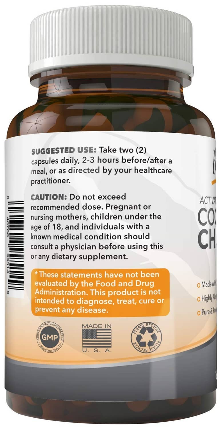 Activated coconut charcoal dietary supplement bottle with suggested use and caution text