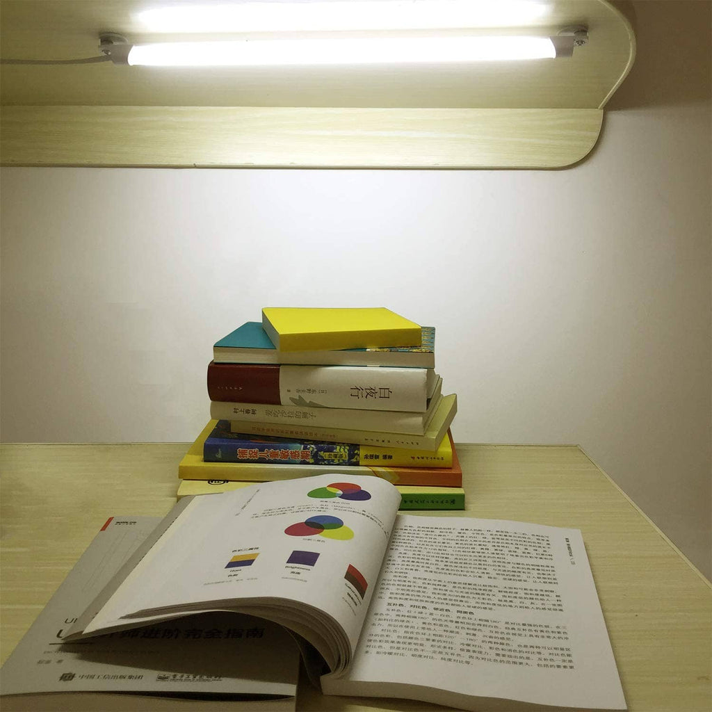 Lit STBTECH under-cabinet LED light bar under shelf