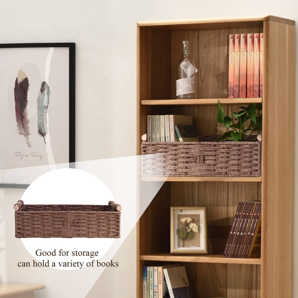Brown woven basket with side handles on open wooden shelving