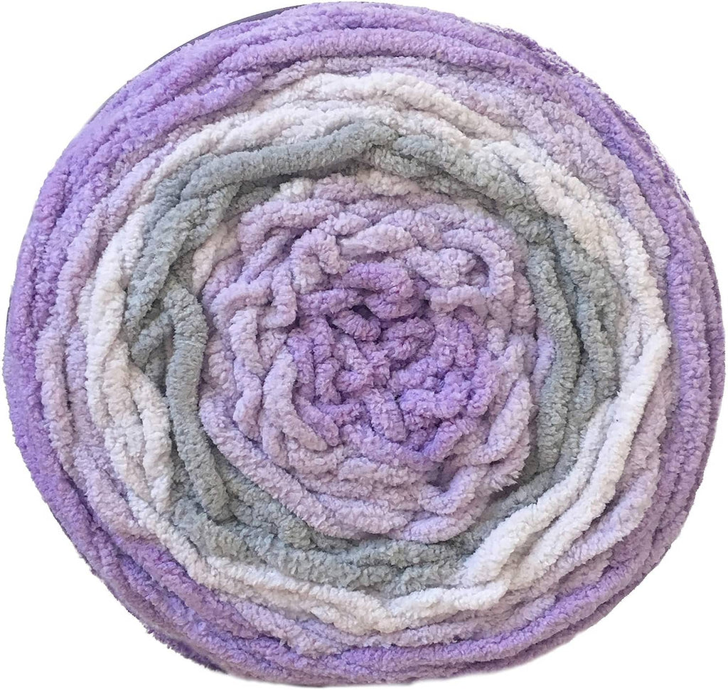 Ombre blanket yarn skein with spiral layers in lavender, white, and gray tones