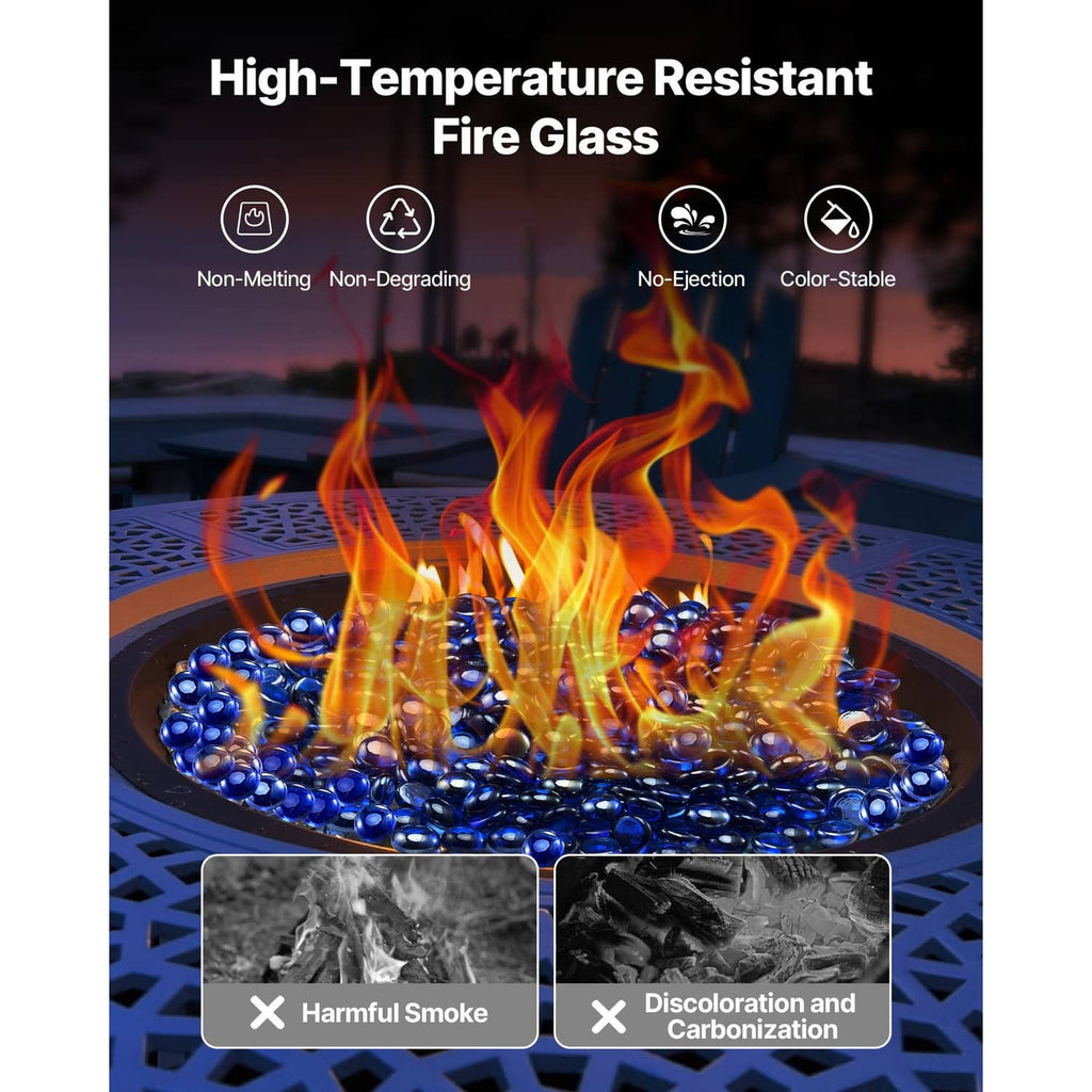Cobalt blue round fire pit glass stones with tall flames across the top layer