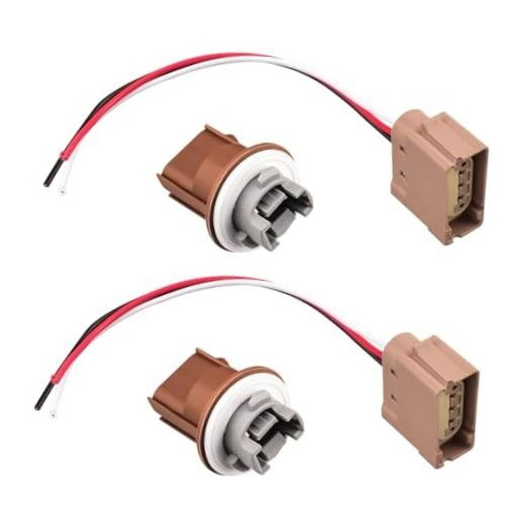 Pair of turn signal socket pigtails; brown housings, white sockets, red/black wire leads.