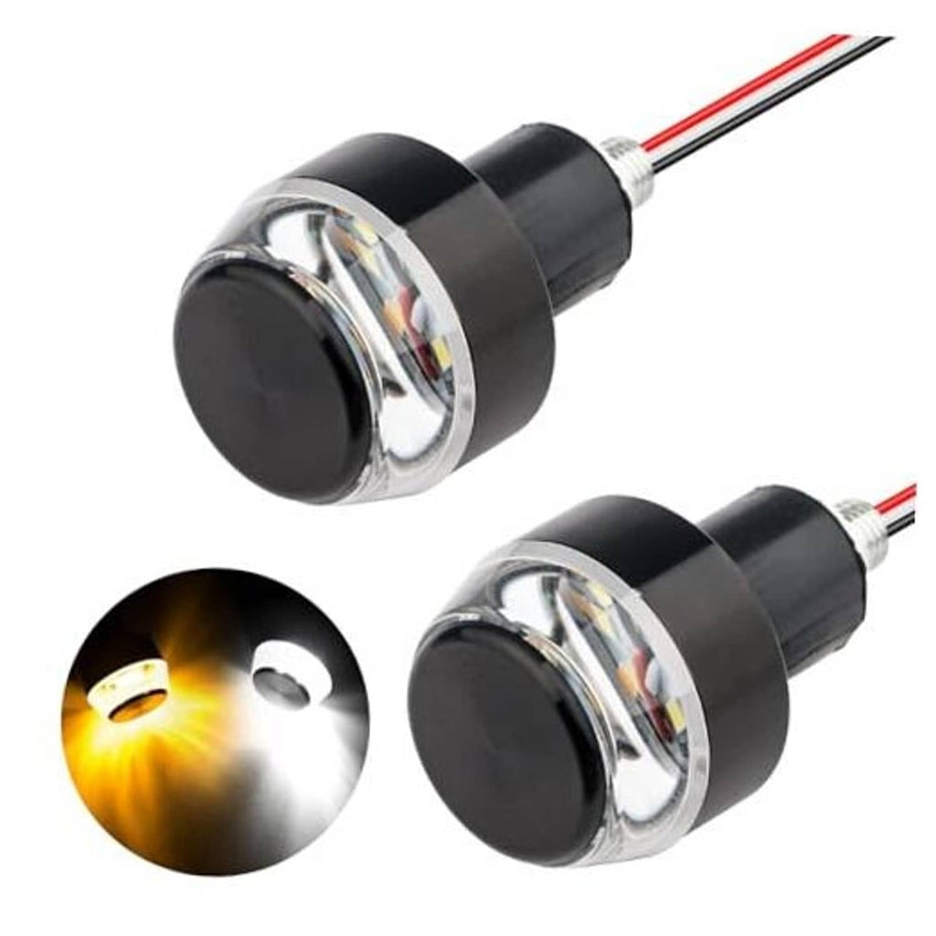 Motorcycle LED turn signal light set with black housings and amber glowing front lens
