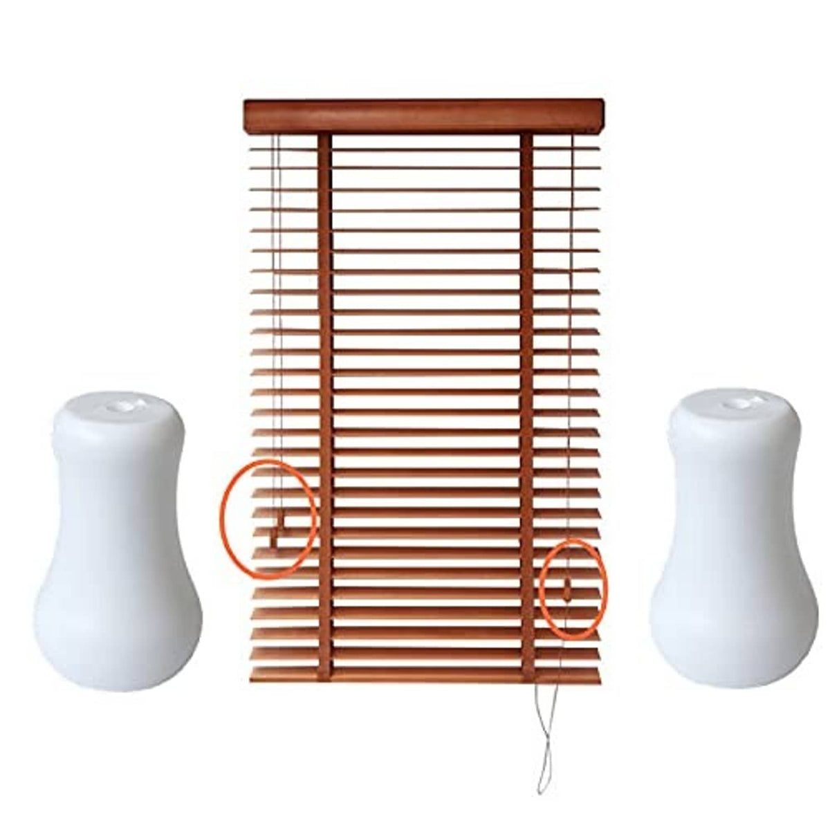 White plastic blind cord tassel knobs attached to a window blind with cords