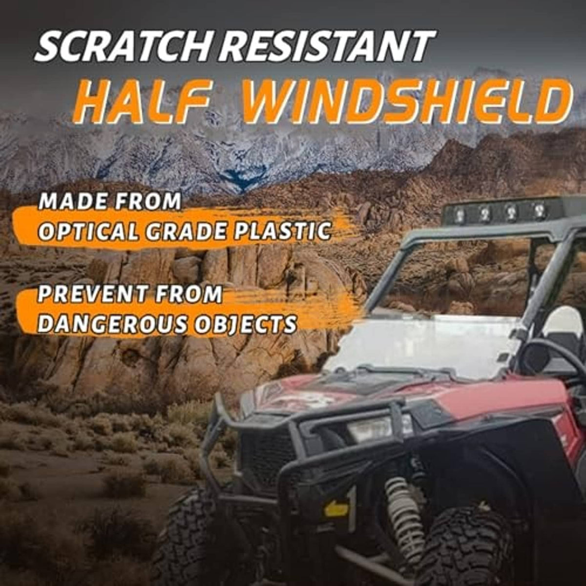 Half windshield with clear panel on off-road UTV, dashboard and seats visible