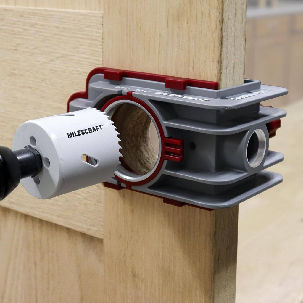 Self-clamping door drilling jig mounted on wood for lock and hinge hole drilling
