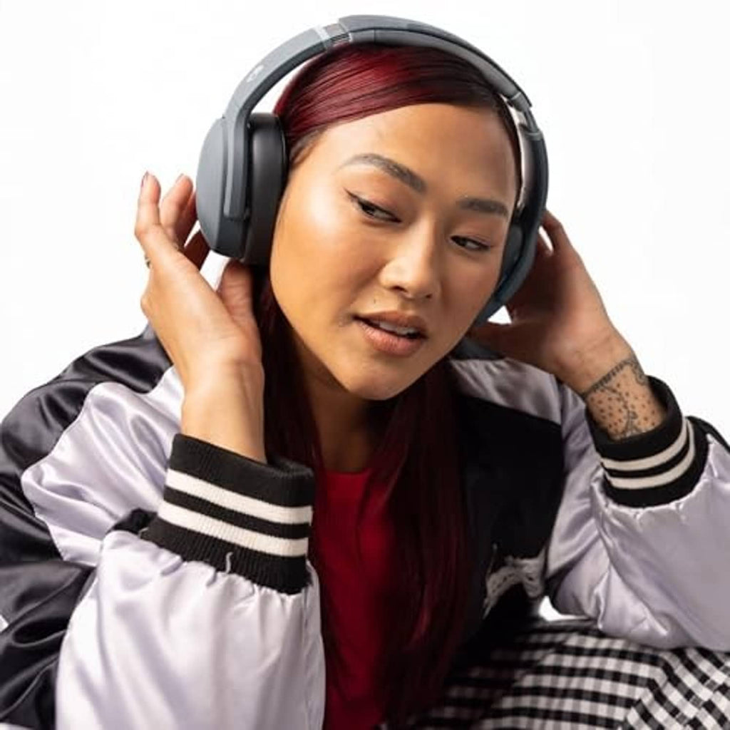 Chill grey wireless over-ear headphones on a woman wearing them