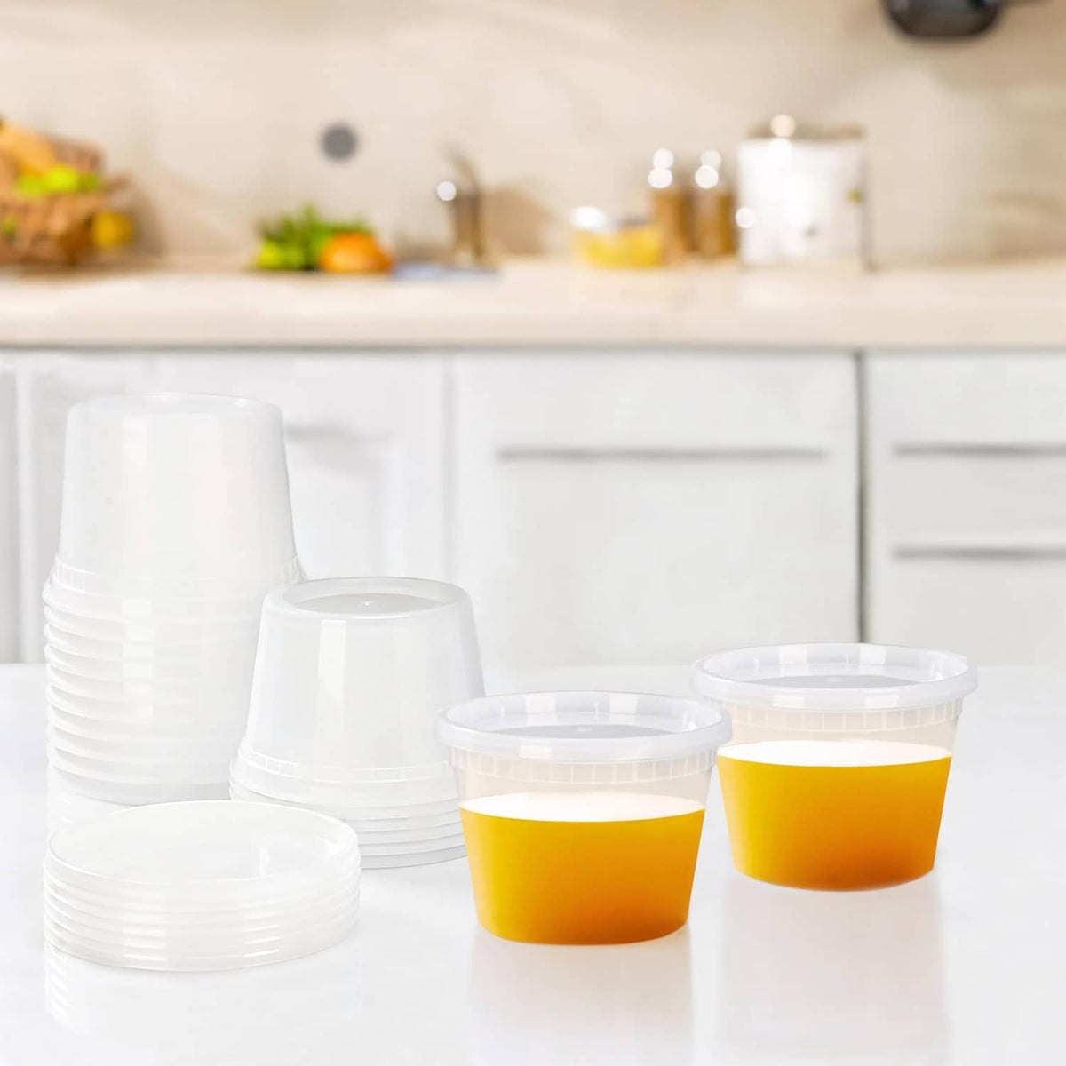 Clear plastic deli containers with lids, stacked for organized countertop or fridge use