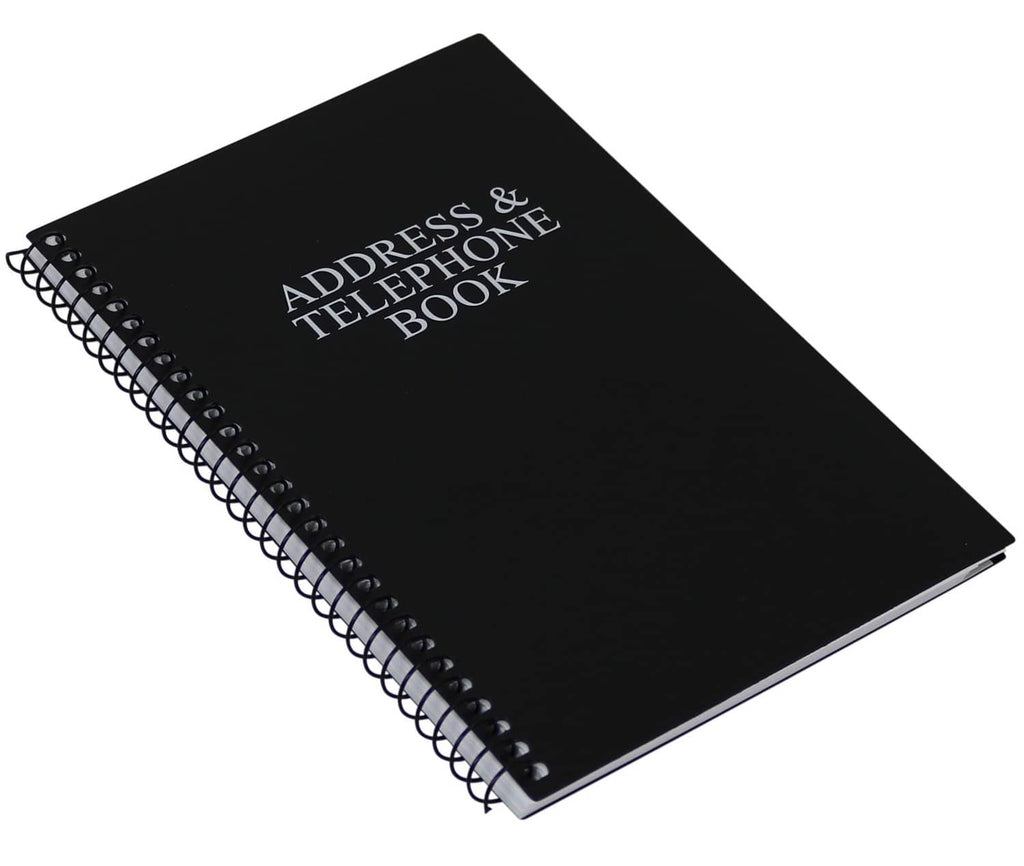 Black address & telephone book with spiral rings and title on cover, angled view