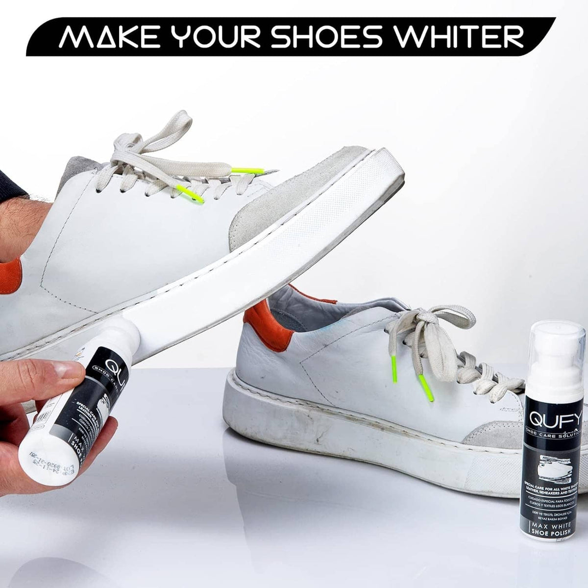 White sneakers being cleaned with white shoe polish bottle