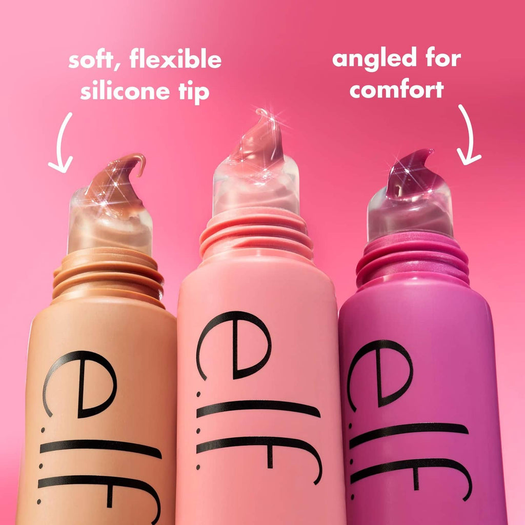 Set of squeeze lip balm bottles with angled silicone tips and pink caps