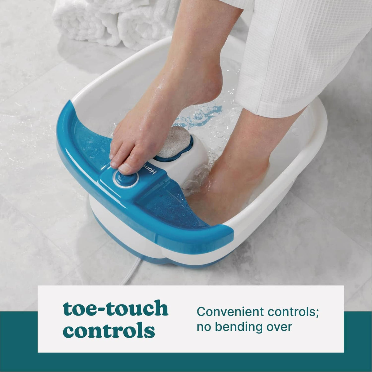 Blue foot spa with toe-touch control pad and feet soaking in bubbly water