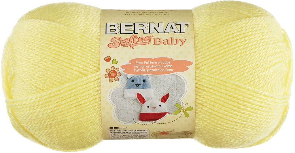 Light yellow Bernat Softee Baby acrylic yarn skeins with front label