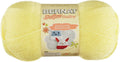 Light yellow Bernat Softee Baby acrylic yarn skeins with front label