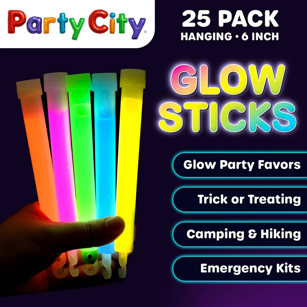Hand holding glowing 6-inch multi-color sticks in green, blue, pink, yellow