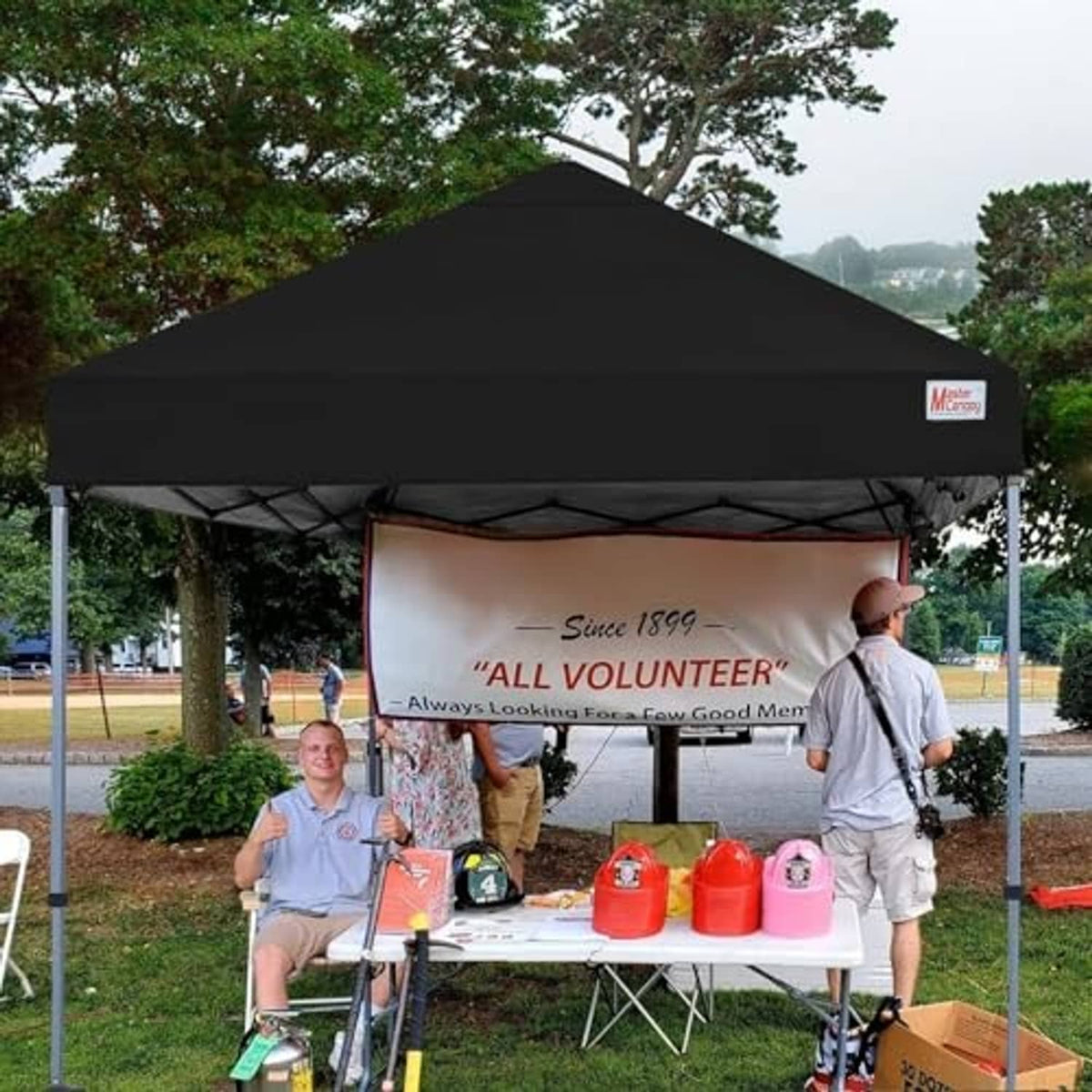 Black replacement pop-up canopy top open over event table, no side walls