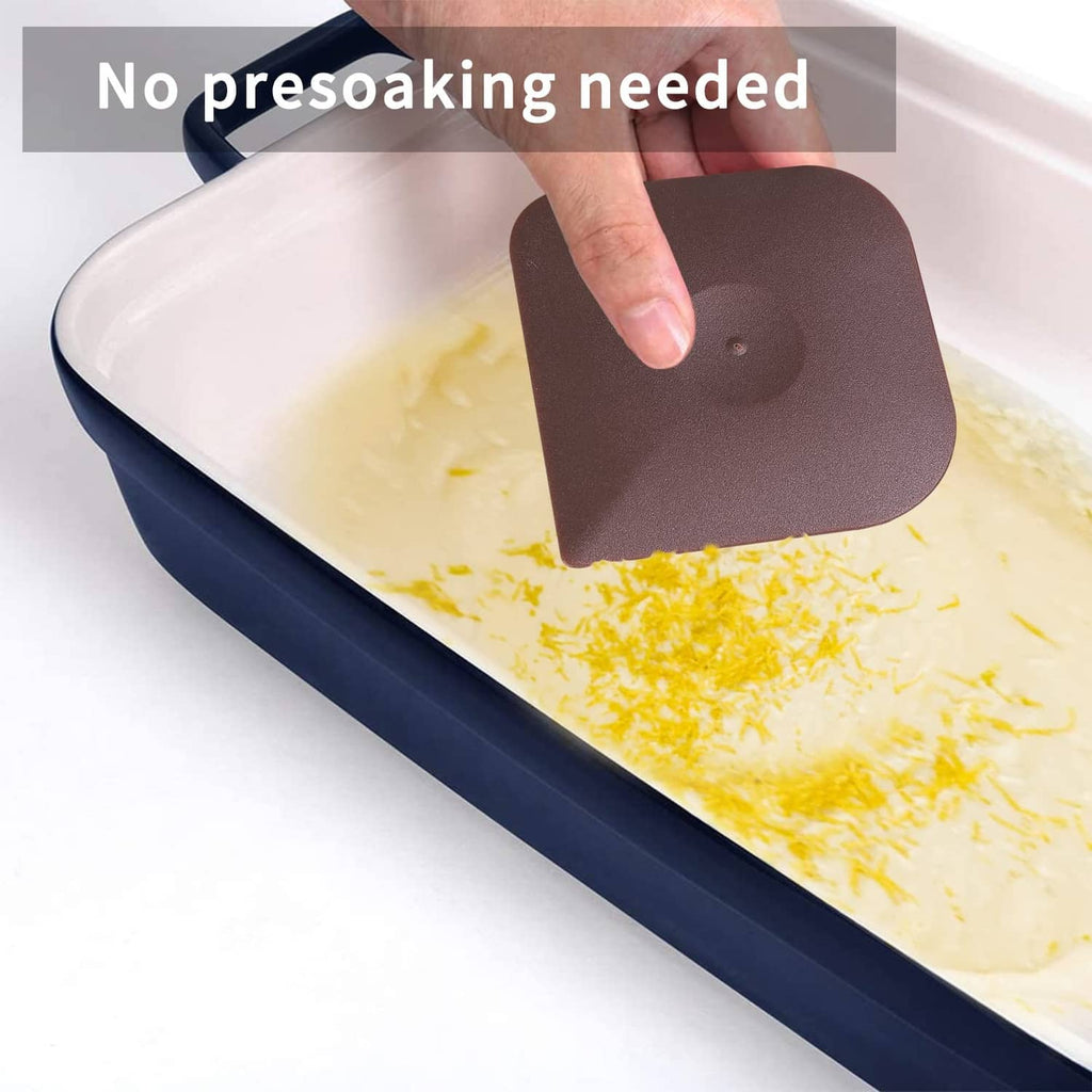 Brown plastic scraper pad used to spread and lift mess from a dish
