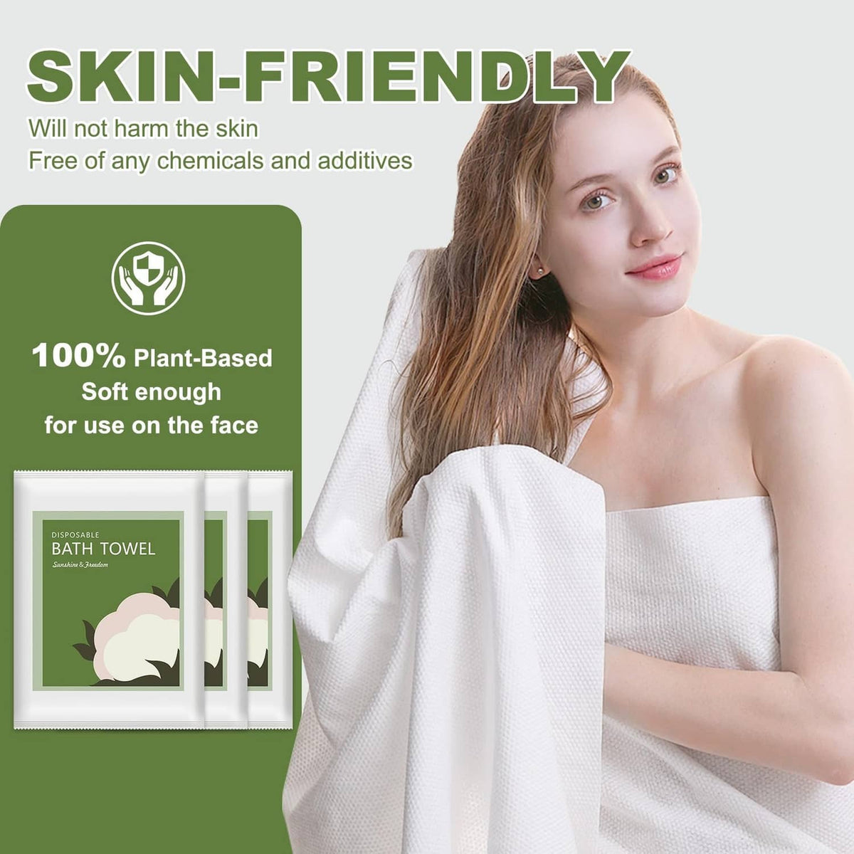 White disposable bath towel held by a person, with small packaging pouch