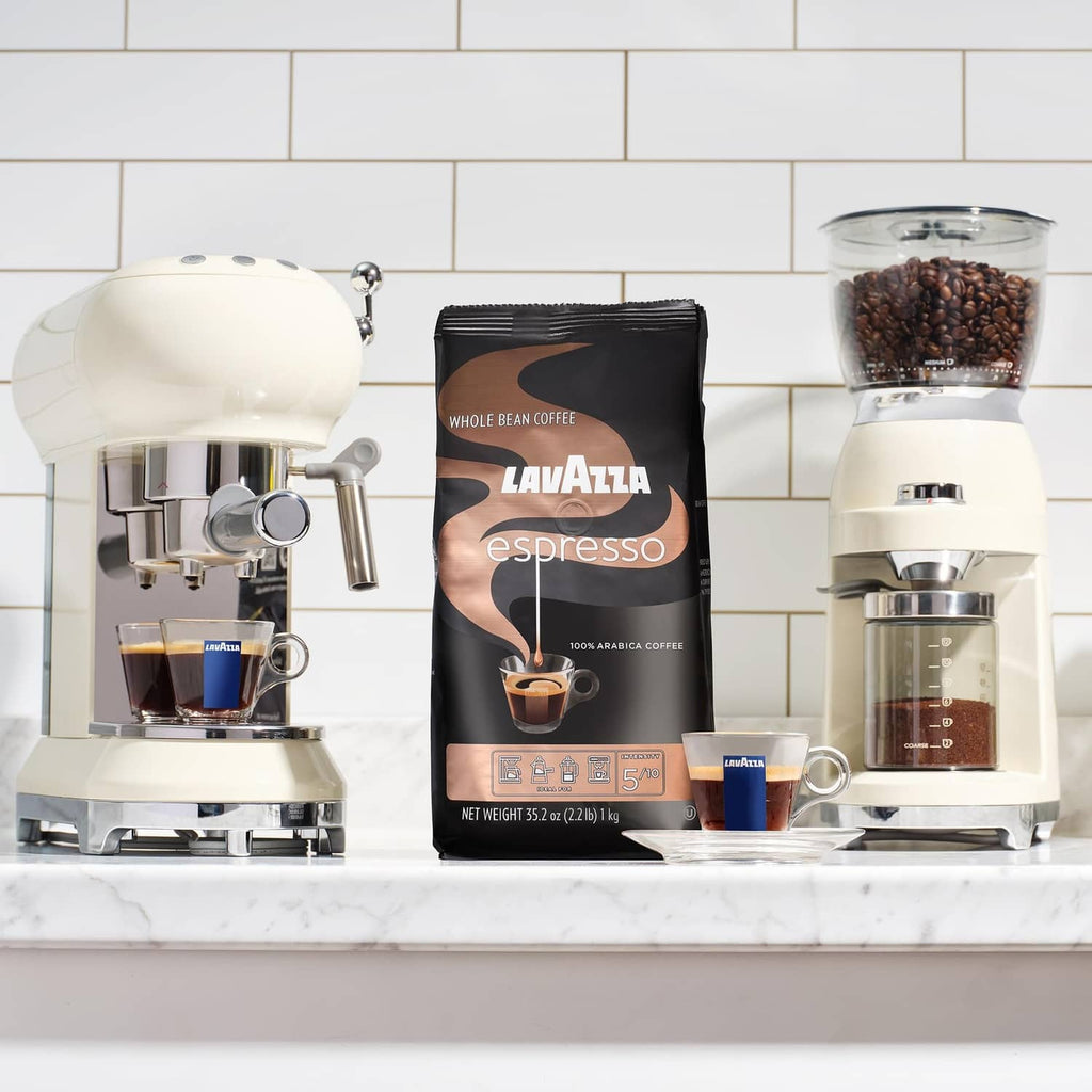 Lavazza espresso whole bean coffee bag between espresso machine and grinder