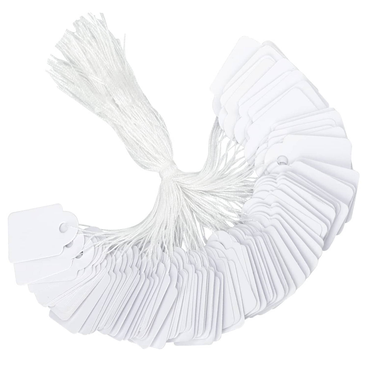 Set of white price tags with attached string, fanned stack of tag cards