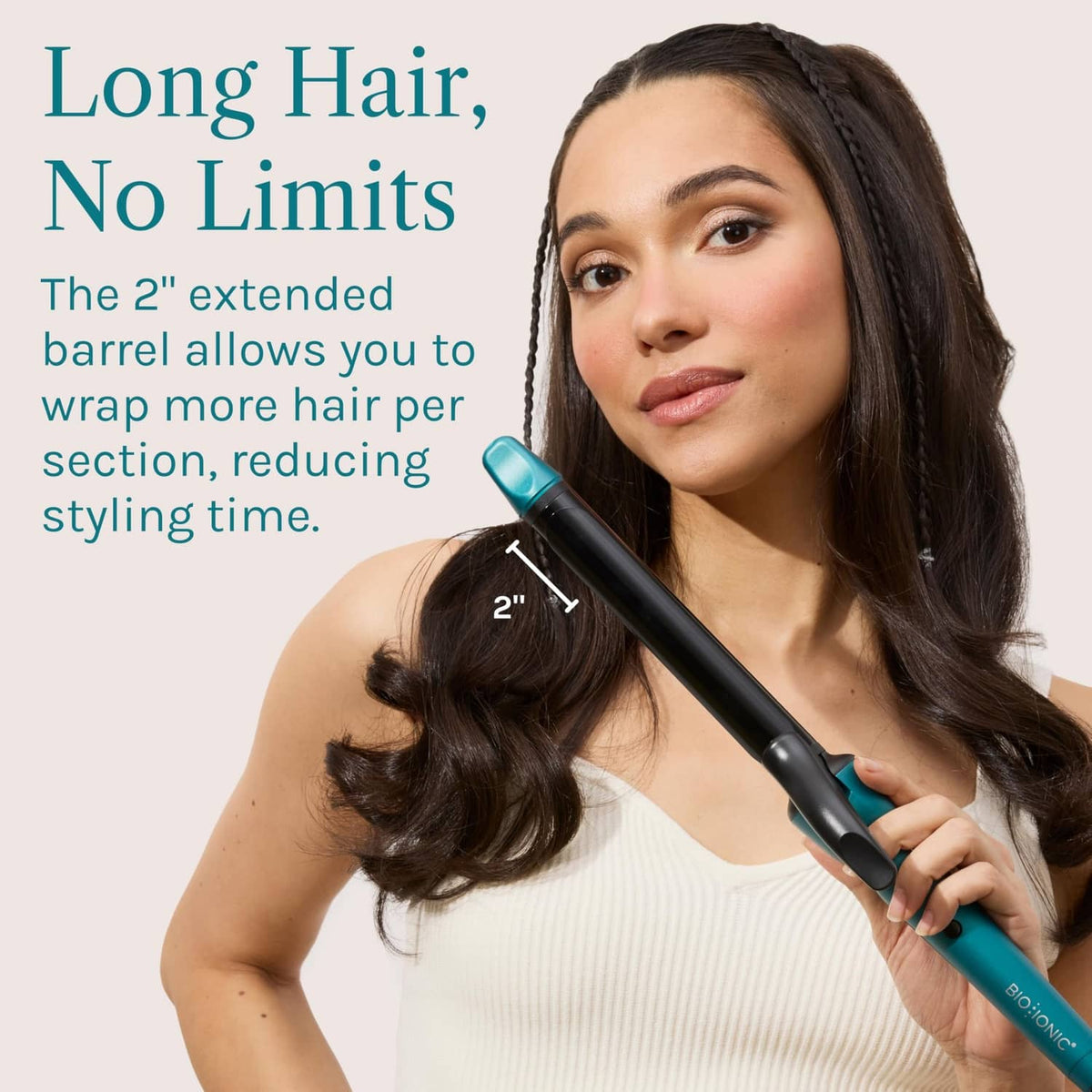 Teal and black long-barrel curling iron held by a woman with shoulder-length dark hair.