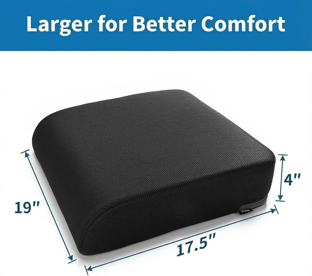 Thick black seat cushion pad with rounded top and textured fabric cover.