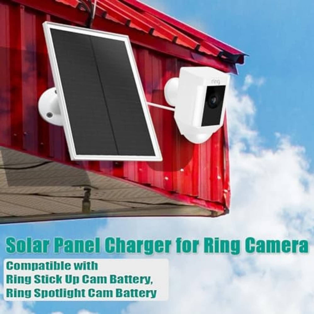 Solar panel with wall-mounted camera charger attached to red outdoor siding