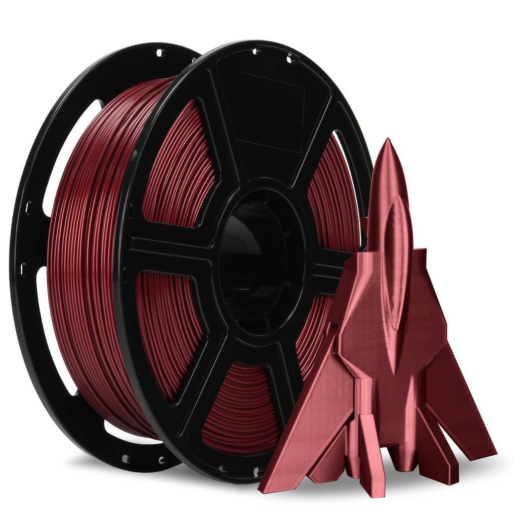 Metallic red PETG filament spool with coiled filament and stacked end pieces