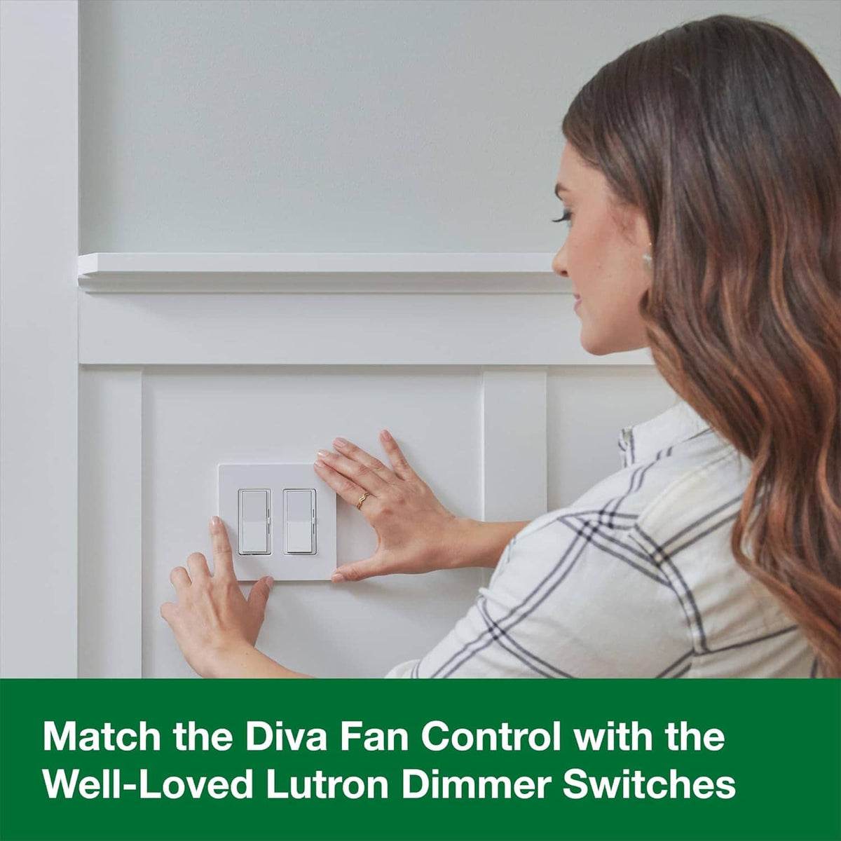 White fan speed control wall switch installed on a wall next to other switches