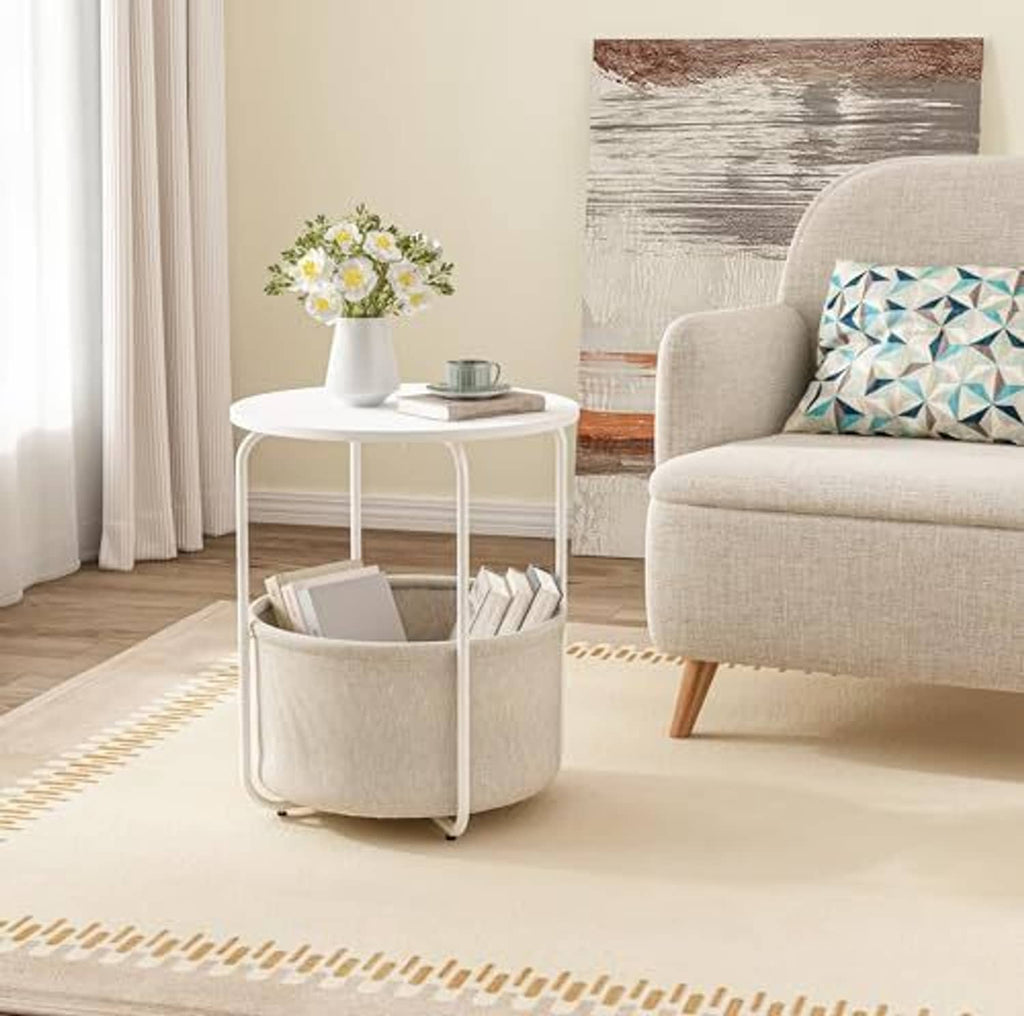 White round end table with beige fabric storage bin, open top and metal legs
