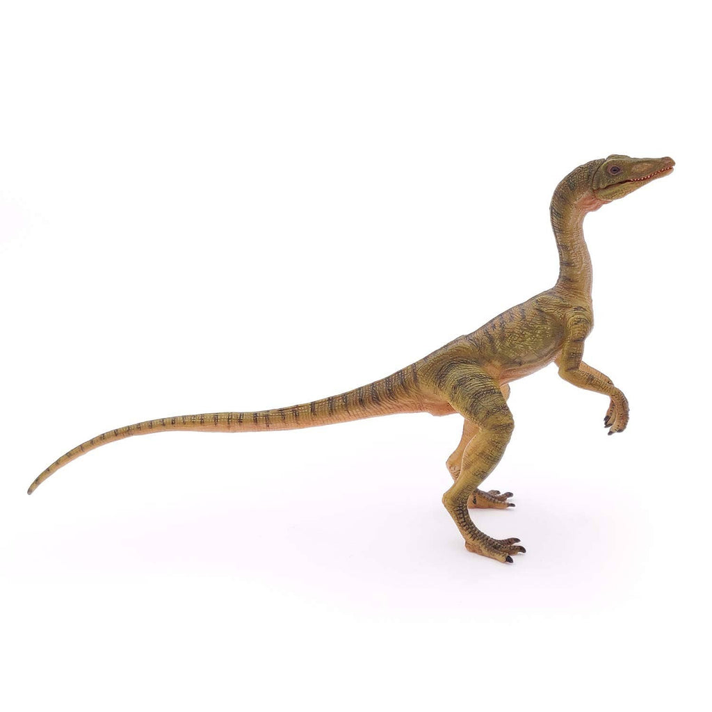 Compsognathus dinosaur figurine shown in side view with textured scales.