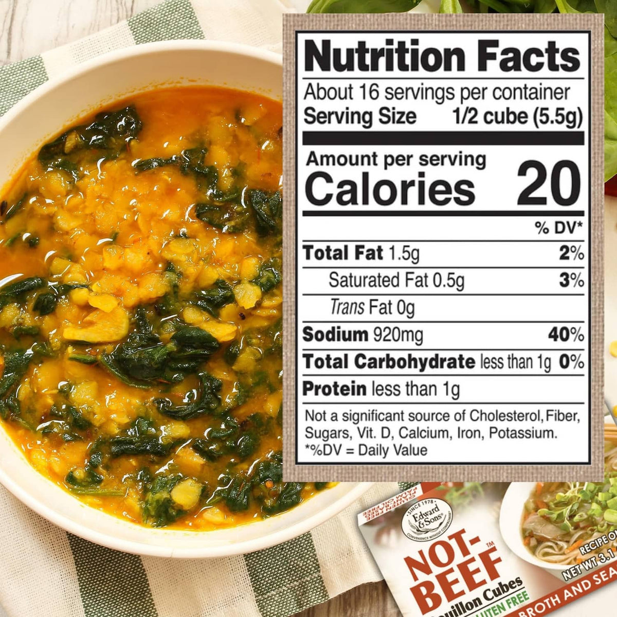 Bowl of vegetable broth soup with greens, next to Nutrition Facts panel