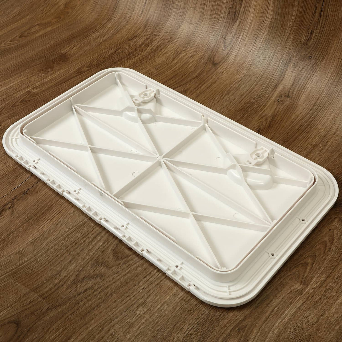 White ABS deck access hatch lid with open base and molded storage ribs