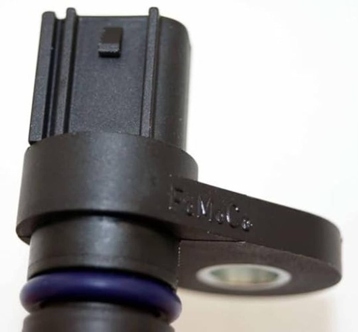 Camshaft position sensor close-up of black connector and blue-ring seal
