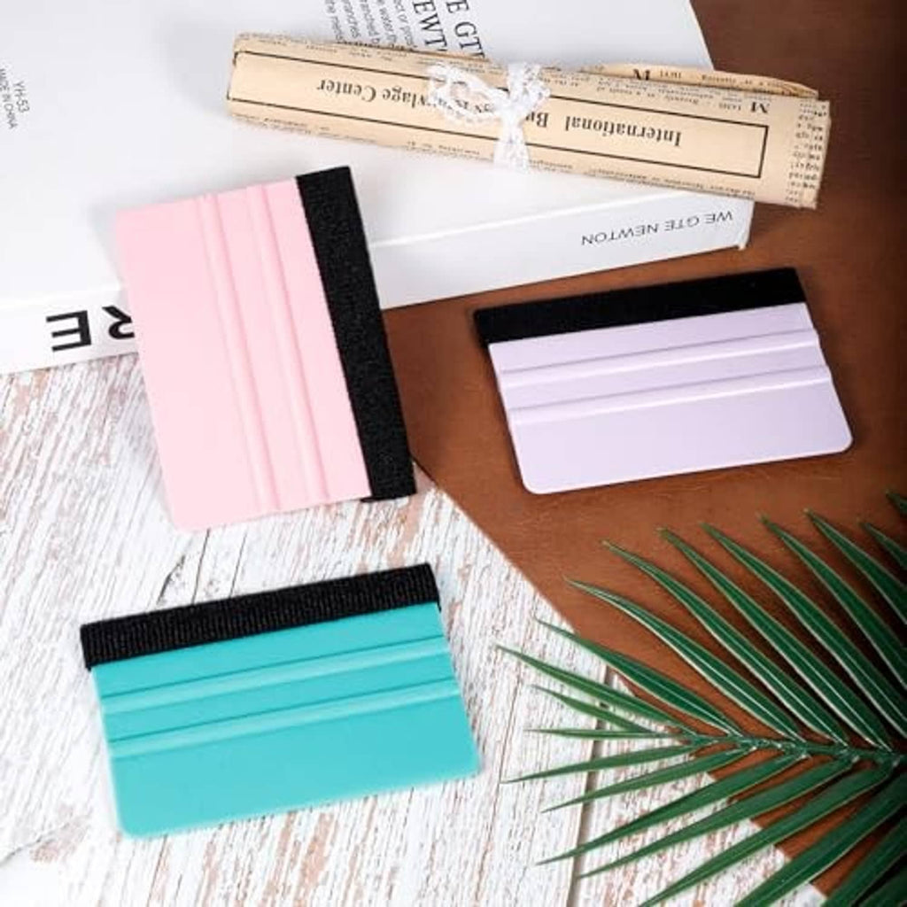 3-pack felt squeegee tool pads with black grip in pink, purple, and teal