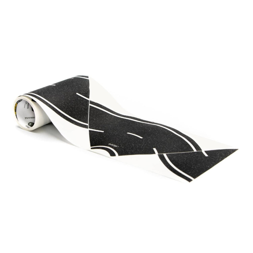 Asphalt-style toy road tape roll with black surface and white lane markings, curved strip