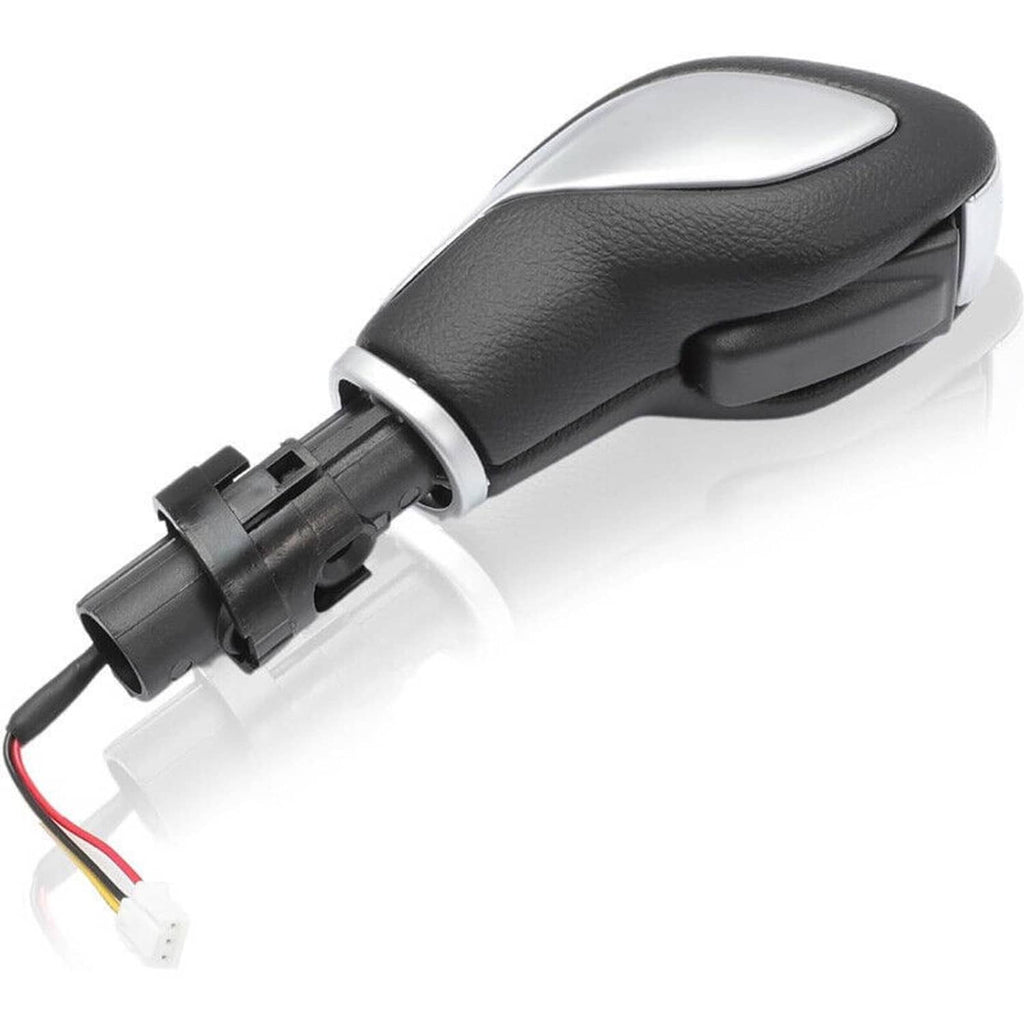 Automatic transmission shift knob with black grip and connector base, wiring visible
