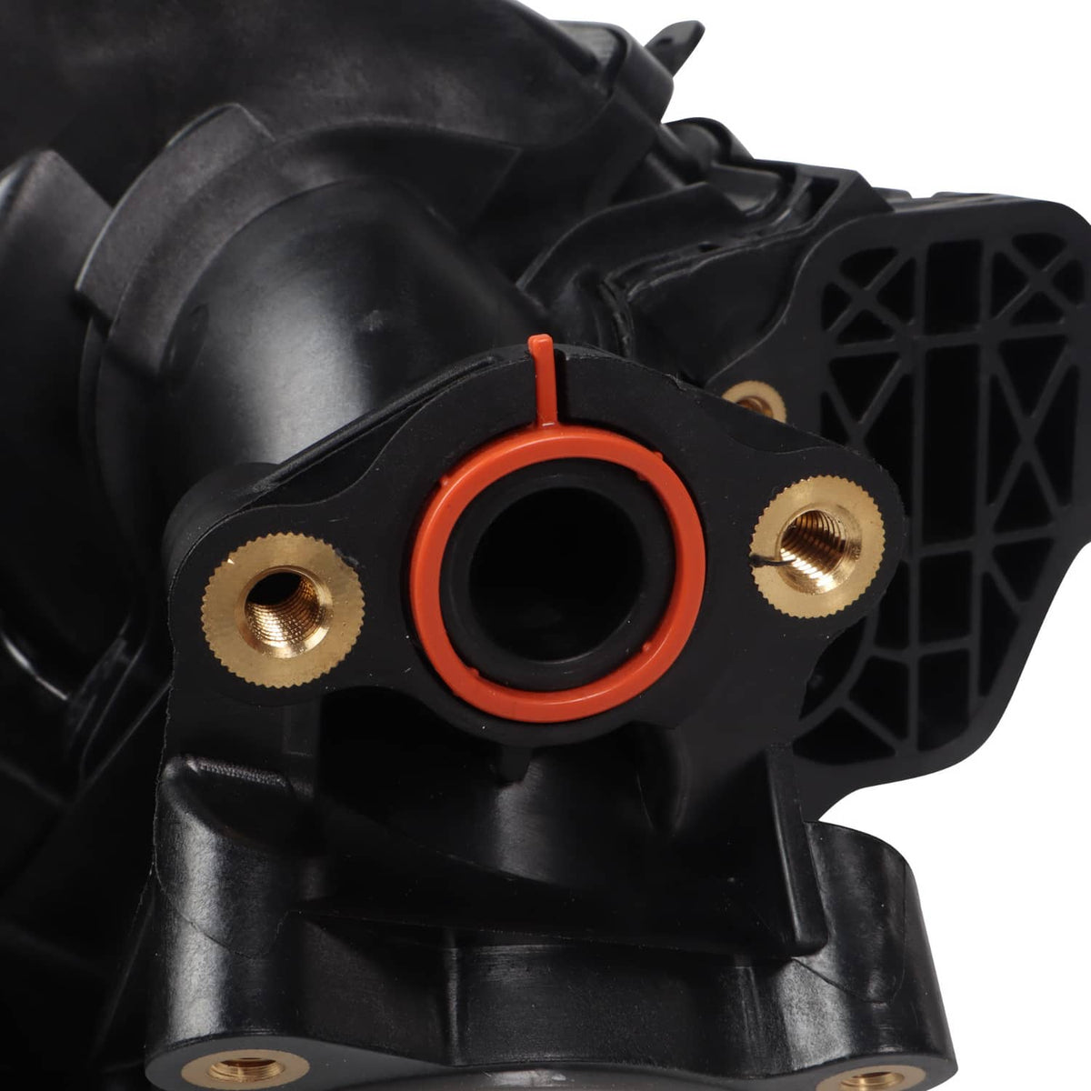 Air intake manifold close-up with black housing and orange seal ring
