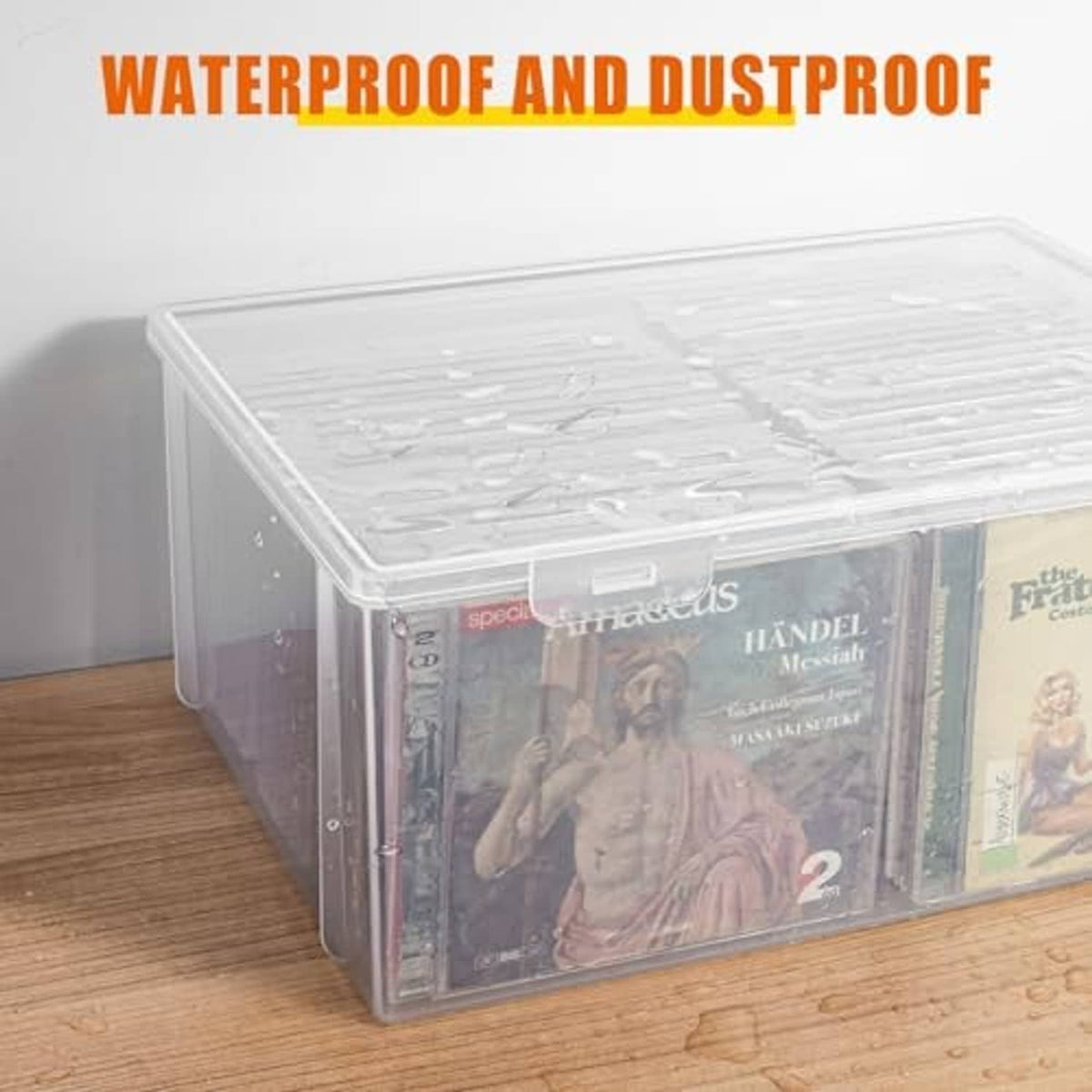 Clear plastic CD organizer with lid and CDs inside; water-splash effect on the surface