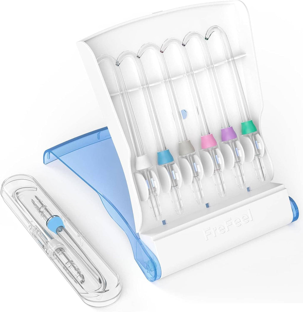 Replacement water flosser tips in white holder with blue, pink, purple, green bases