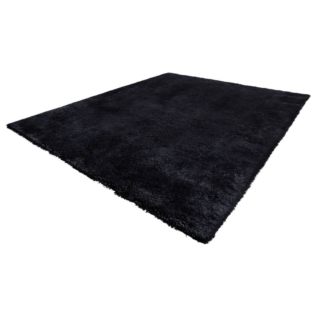 Black plush rectangular rug with dense shag pile and smooth, even surface