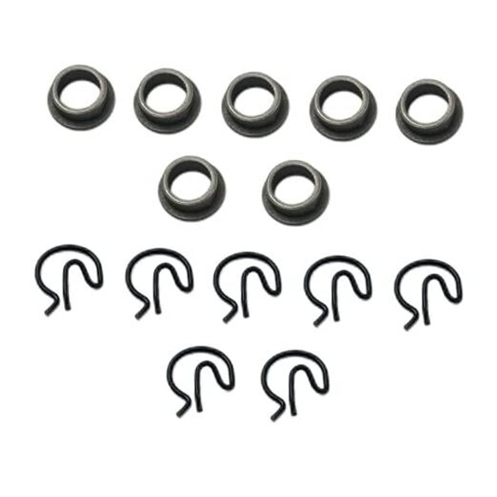 Manual transmission shifter bushing set with steel rings and U-shaped spring clips
