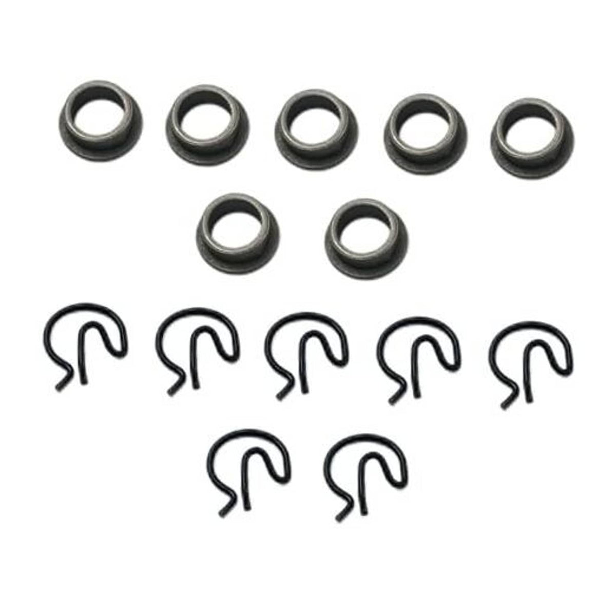 Manual transmission shifter bushing set with steel rings and U-shaped spring clips