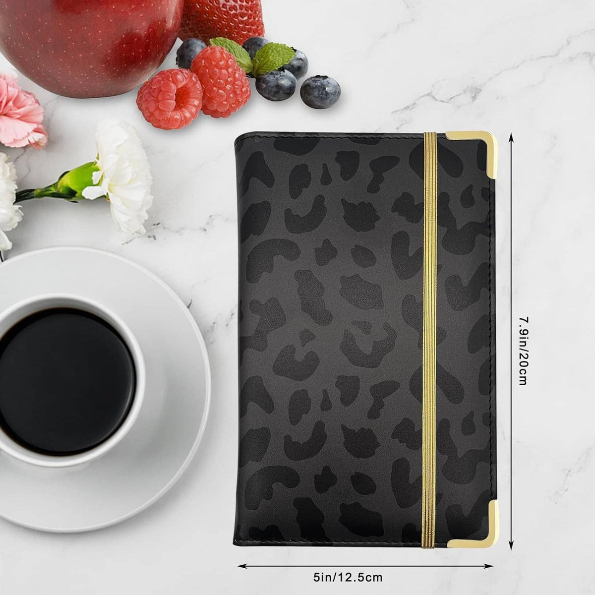 Leopard-print server book with gold vertical stripe, compact front cover, black pattern.