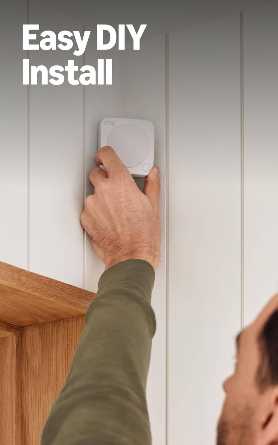 White Ring alarm keypad being installed on a door