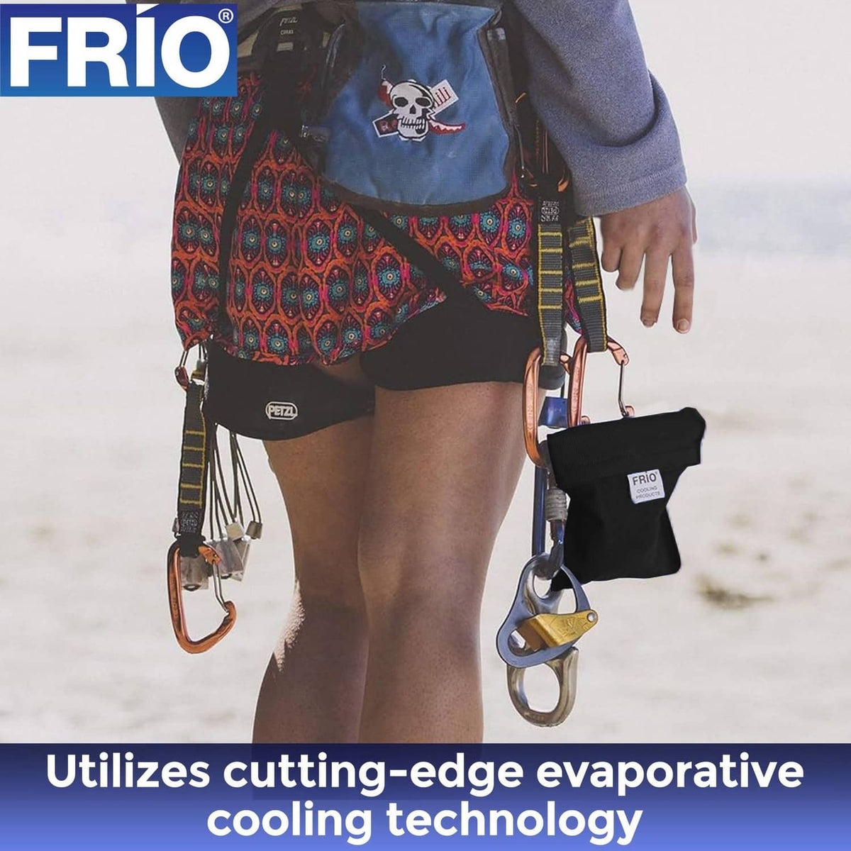 FRIO black cooling wallet pouch clipped to a person’s belt bag