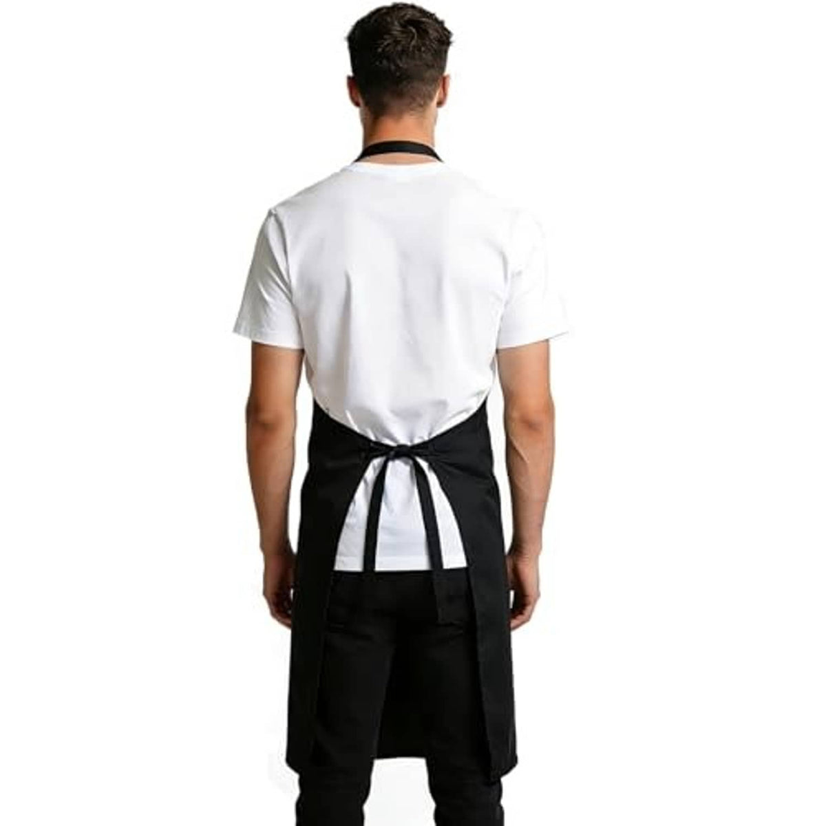 Black apron back view with adjustable neck strap and waist tie.